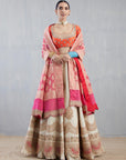 Ecru Lehenga Set With A Pink Bandhni Dupatta And Orange Blouse