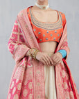 Ecru Lehenga Set With A Pink Bandhni Dupatta And Orange Blouse