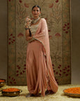 Embellised Bustier Paired With Pink Embellished Saree Draped Skirt