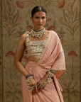 Embellised Bustier Paired With Pink Embellished Saree Draped Skirt