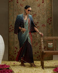 Red Blue Ombre Print Cascade Saree With Metal Embellished Bustier Paired With Blue Ombre Embellished Cape Jacket