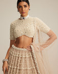 Light Beige Pearl Drop Multi Tier Lehenga With High Neck Blouse Set.