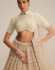 Light Beige Pearl Drop Multi Tier Lehenga With High Neck Blouse Set.