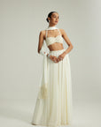 Off White Skirt Set With Halter Neck Blouse
