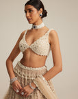 Light Beige Pearl Drop Multi Tier Lehenga Set.