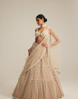 Light Beige Pearl Drop Multi Tier Lehenga Set.