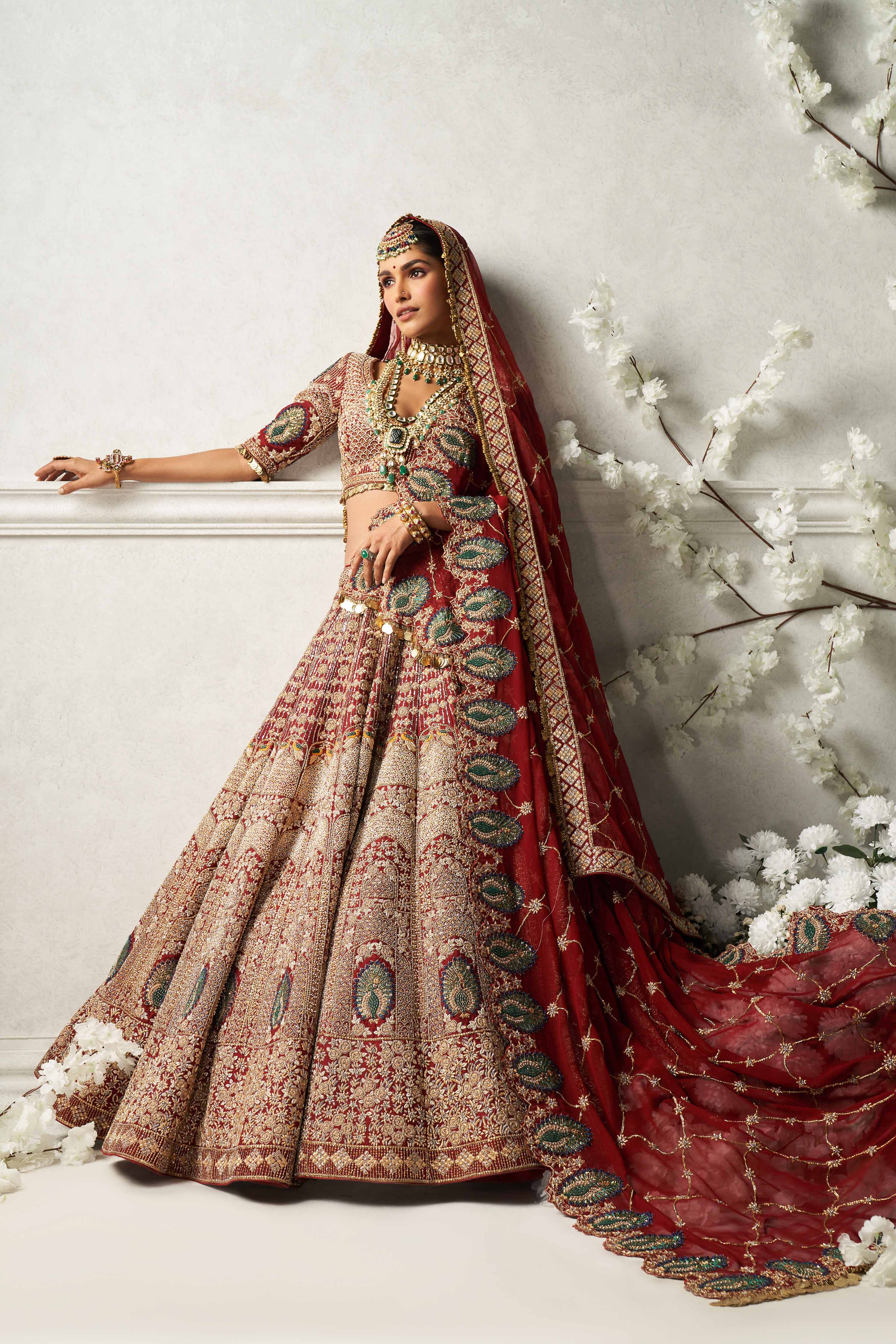 Deep Maroon Bridal Lehenga With Hand Emroidered Peacock Motifs And Two Dupattas
