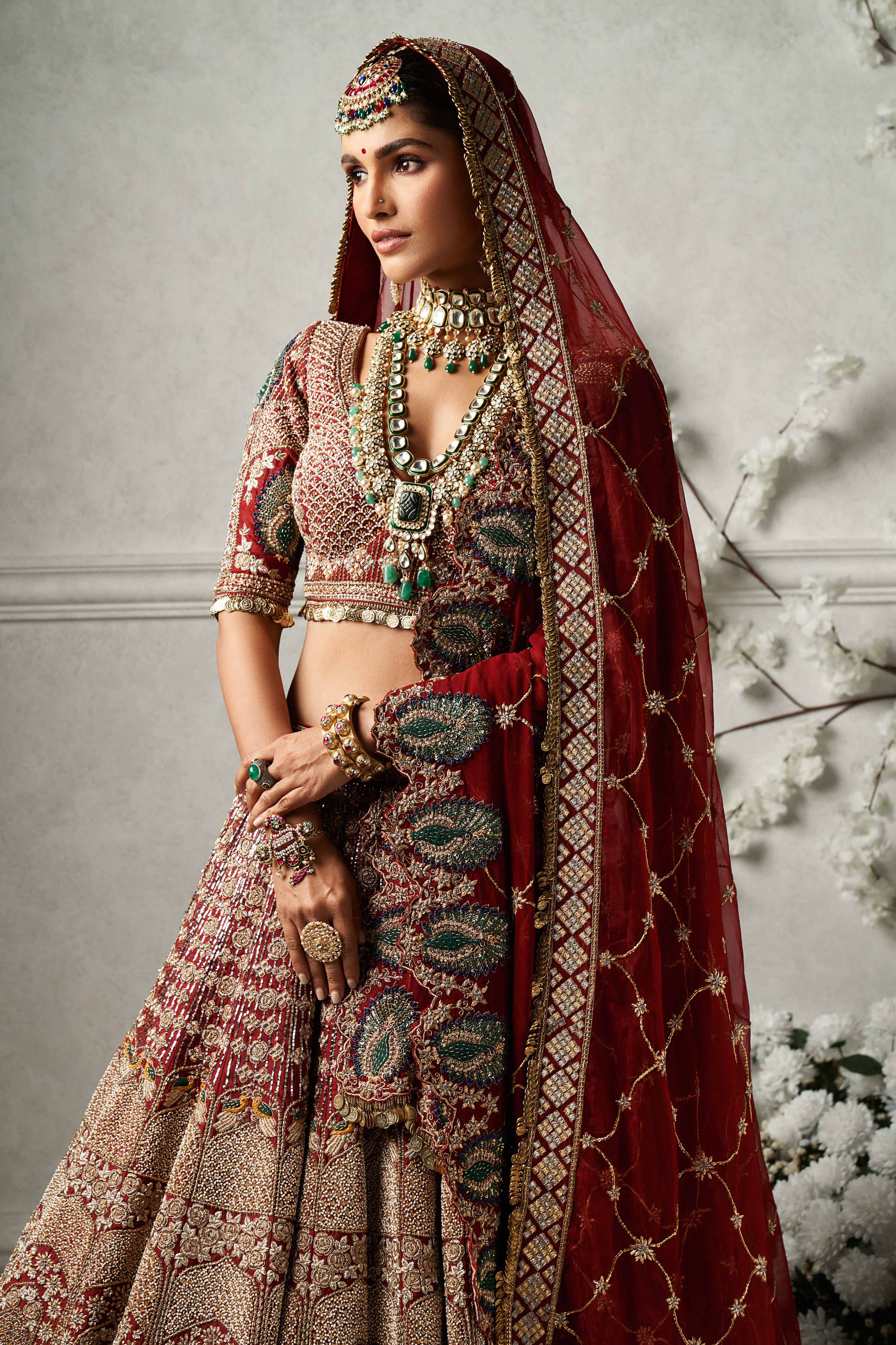 Deep Maroon Bridal Lehenga With Hand Emroidered Peacock Motifs And Two Dupattas